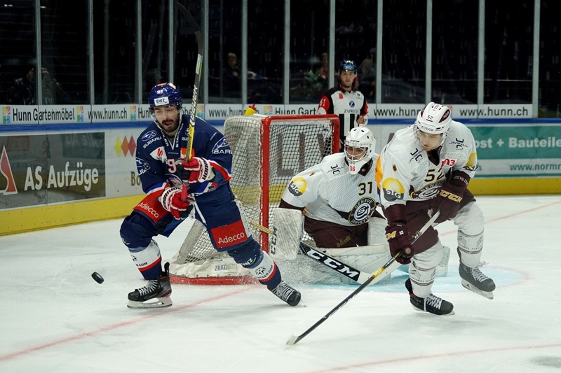 Battle for the puck in ice hockey